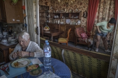 PANTIN, FRANCE - 17 APRIL 2020: Severine Deshayes (36) mother of one, from Clichy-sous-bois is caring for 90-years-old Mrs Pennec. 4 times a week she prepares her lunch, cleans her flat in Pantin. Mrs Pennec is not an easy one, she is very angry at Severine, because she likes being on her own and she treats Severine like an intruder in her life. She doesn't appreciate Severine's conversation or even presence. For Severine who is working from 8.30 am to 10 pm it's very difficult. Severine works for an agency "ouihelp" providing care for the persons in need. (Picture by Veronique de Viguerie/Getty Images)