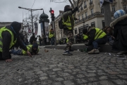 PARIS, FRANCE - DECEMBER 01: Clashes between the police and the Yellow Vests nearby the Champs ElysÃ©es on December 8, 2018 in Paris, France. The demonstrators, known as "gilets jaunes" or "yellow vests," have protested across France for the last two weeks, demanding a reduction in fuel prices. French law requires drivers to carry yellow vests in case of accident. (Photo by Veronique de Viguerie/Getty Images for the Washington Post)