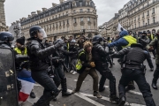 PARIS, FRANCE - DECEMBER 15: Clashes between the police and the Yellow Vests at Opera, on December 15, 2018 in Paris, France. The protesters gathered in Paris for a 5th weekend despite President Emmanuel Macron's recent attempts at policy concessions, such as a rise in the minimum wage and cancellation of new fuel taxes. But the 'Yellow Vest' movement, which has attracted malcontents from across France's political spectrum, has shown little sign of slowing down. (Photo by Veronique de Viguerie/Getty Images)