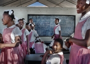 PORT-AU_PRINCE, HAITI-NOV, 2014: Une ecole ouvre ses portes aux Restaveks (enfants esclaves) pour qu'ils puissent suivre des cours gartuitement et profiter d'un repas gratuit.  (Photo by Veronique de Viguerie/Reportage by Getty images).