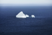 ST JOHN'S, NEWFOUNDLAND-JUNE, 2014: Un iceberg echoue dans la baie de Fort Hampers a Saint Jean, a Terre Neuve.  An iceberg and Fort Hampers in St John's. From Signal Hill. (Picture by Veronique de Viguerie/Reportage by Getty Images).