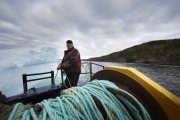 SWEET BAY, NEWFOUNDLAND- JUNE, 2014: Ed Kean is attaching the barge to the iceberg. (Picture by veronique de Viguerie/Reportage by Getty Images.)