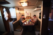 GREEN WATERS, NEWFOUNDLAND-JUNE, 2014: Captain Ed Kean and Ingeneer Philip Kennedy are taking their breakfast on board at sunrise. (Picture by Veronique de Viguerie/Reportage by Getty Images).