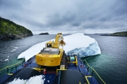 SWEET BAY, NEWFOUNDLAND-JUNE, 2014: To harvest the iceberg, Ed Kean uses a grabber who can take off a 500 kg of ice from the iceberg each time. The harvesting of the iceberg. (Picture by Veronique de Viguerie/Reportage by Getty Images)