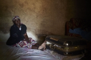 CHIBOK, NIGERIA-JUNE, 2014: Yana in her daughter's bedroom. Rifkatu kept all her clothings in this suitcase. She was kidnapped on the 14th of April. (Picture by Veronique de Viguerie/Reportage by Getty Images).