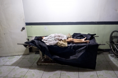 MANILA, PHILIPPINES - OCT, 2016: The savaged body of a 7-year-old girl is waiting in a morgue. The police is accusing a former drug addict to have raped then killed her. The police wants to publicize the case to justify its war on drugs which already made more than 3000 victims in  less than 4 months. (Picture by Veronique de Viguerie/ Reportage by Getty Images).