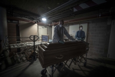 MULHOUSE, FRANCE- 27 MARCH 2020: Jeremy and Frederic undertakers are taking off the dead body of an old woman who died of Covid 19 in her Ephad (old people house). (Picture by Veronique de Viguerie/Getty Images)