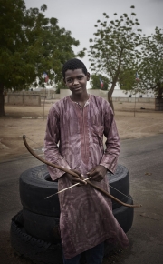 MAIDUGURI, NIGERIA-JUNE, 2014: A young vigilante armed with an arrow is at a check point at Maiduguri's entrance. (Picture by Veronique de Viguerie/Reportage by Getty Images)