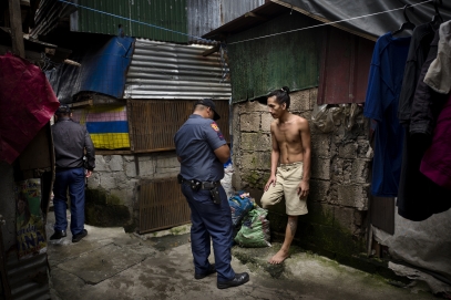 MANILA, PHILIPPINES - OCT, 2016: A suspected drug user is searched and arrested during a Tokham Operation in the Tali Papa branguay in Quezon city. (Picture by Veronique de Viguerie/ Reportage by Getty Images).