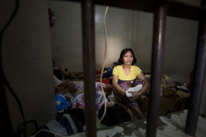 MANILA, PHILIPPINES - OCT, 2016: Serila (45) mother-of-four is in this cell since one month. Her husband is a baranguay and ashamed of her, does not visit neither allow their children to come and visit her. Overcrowded cell in a Police station in Quezon City. (Picture by Veronique de Viguerie/ Reportage by Getty Images).