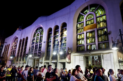 MANILA, PHILIPPINES - OCT, 2016: The Black Nazarin, Kuiapo church attracts thousands of fidels. They queue outside, watching the mass on a big screen. Flor John was a fidel of this church, having a reputation for miracles.  (Picture by Veronique de Viguerie/ Reportage by Getty Images).